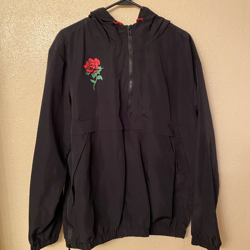 black windbreaker